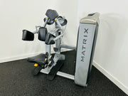 Matrix G7 Commercial Lateral Raise Machine, featuring padded arms and an adjustable seat in a gray color, designed for shoulder isolation.